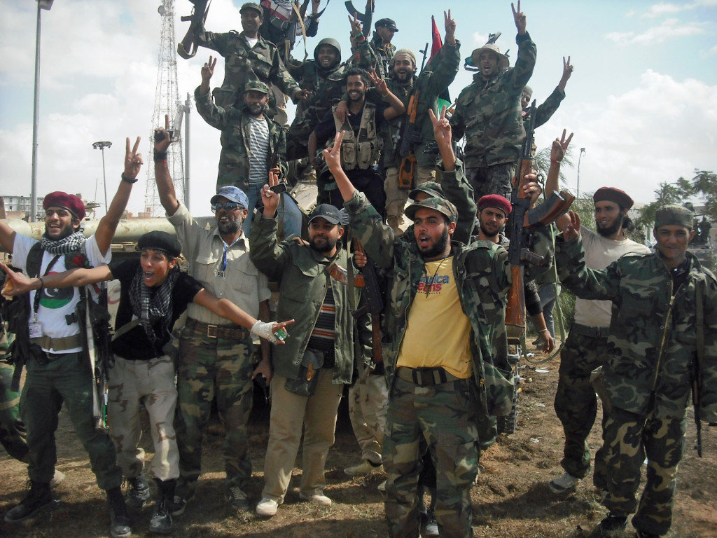 Fighters for Libya's interim government rejoice after winning control of the Kadhafi stronghold of Bani Walid. Picture by Magharebia | Flickr